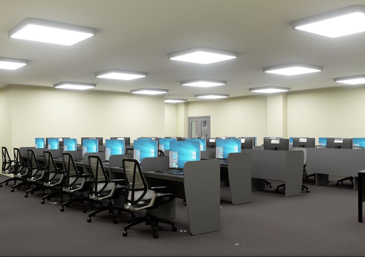 Computer lab installation with rows of desks and ergonomic chairs