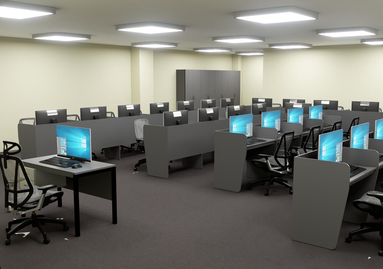 Computer lab with grey desks and mesh chairs