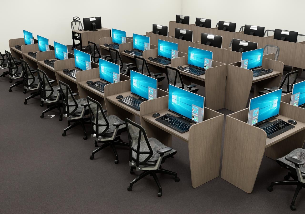 Computer lab with cubicle desks and mesh chairs